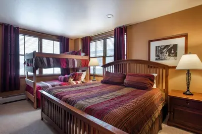 a bedroom with two beds in a room at Premium Ski-Slope View Two Bedroom Zephyr Mountain Lodge Condo condo in Winter Park