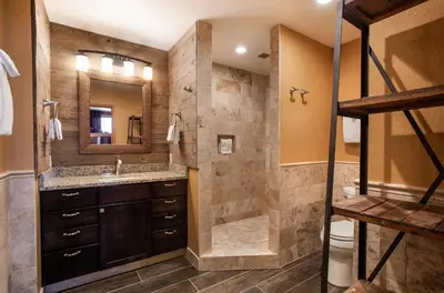 a bathroom with a shower and a sink at Premium Ski-Slope View Two Bedroom Zephyr Mountain Lodge Condo condo in Winter Park