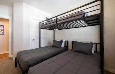 a bedroom with two bunk beds in it at Winter Park FF Select Rated Condo 4654 in Winter Park
