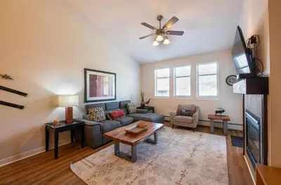 a living room with a couch and a table at Winter Park FF Select Rated Condo 4654 in Winter Park