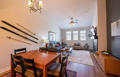 a dining room and living room with a table at Winter Park FF Select Rated Condo 4654 in Winter Park