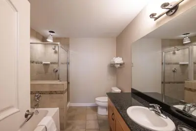 a bathroom with a sink and a shower and a toilet at Winter Park FF Premium Rated Condo 4185 in Winter Park