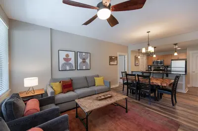 a living room with a couch and a ceiling fan at Winter Park FF Premium Rated Condo 4185 in Winter Park