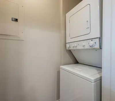 a white washer and dryer in a small bathroom at Winter Park FF Premium Rated Condo 4185 in Winter Park