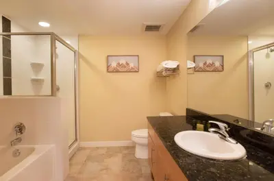 a bathroom with a sink and a toilet and a shower at Charming Fraser Crossing Founders Pointe condo with Easy Gondola Access condo in Winter Park