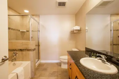 a bathroom with a sink and a shower and a toilet at Townhome Style Fraser Crossing Founders Pointe Condo with Upgraded Furnishings and washer dryer condo in Winter Park