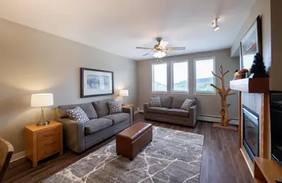 a living room with a couch and a tv at Winter Park FF Premium Rated Condo 3506 in Winter Park