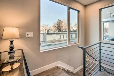 a room with a glass table and a window at Denver Tennyson Townhouse with Rooftop Deck in Denver