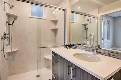 a bathroom with a sink and a shower at Denver Tennyson Townhouse with Rooftop Deck in Denver