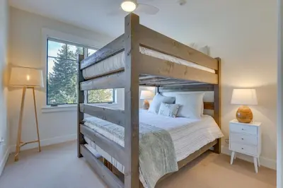 a bedroom with a bunk bed and a window at Winter Park Condo with Balcony about 4 Mi to Slopes in Winter Park