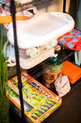 a shelf with food and other items in a room at The Getaway,Hot Tub, AC, 2miles from RMNP in Estes Park