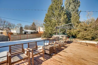 a group of benches sitting on a deck at 9 Mi to Dtwn Quiet South Denver Apartment in Denver