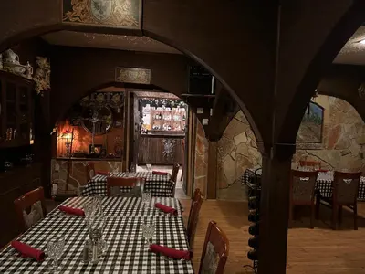 a dining room with a table and chairs at Inn of Glen Haven in Glen Haven