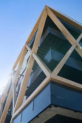 an angled view of a building with glass at Modern Eclectic Penthouse Loft - Zuni Lofts in Denver