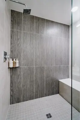 a bathroom with a shower with a tub and a sink at LoHi Clubhouse - Cityscape Panorama - Central LoHi in Denver