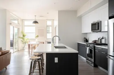 a kitchen with a sink and a counter top at LoHi Clubhouse - Cityscape Panorama - Central LoHi in Denver