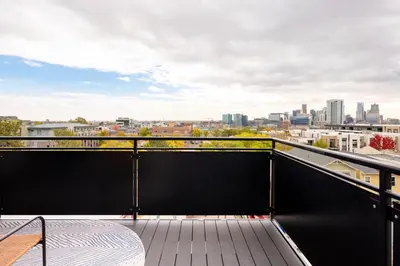 a balcony with a view of the city at Skyline Loft - Sweeping Views - Central LoHi in Denver
