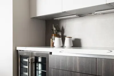 a kitchen with a sink and a counter top at City Views! - Chic Jefferson Park Condo - Tesoro in Denver