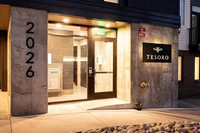 a store front with a sign on the door at City Views! - Chic Jefferson Park Condo - Tesoro in Denver
