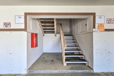 a staircase inside of a building with a stair case at Mtn-View Silverthorne Gem with Shared Hot Tub in Silverthorne