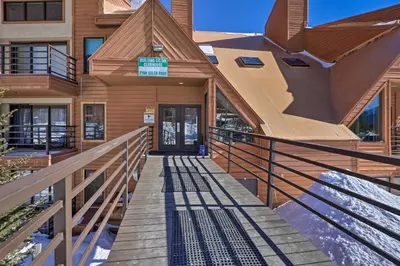 a building with a staircase leading to the front door at Mtn-View Silverthorne Gem with Shared Hot Tub in Silverthorne