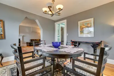 a dining room with a table and chairs at 2 Mi to Washington Park Convenient Denver Home! in Denver