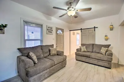 a living room with two couches and a ceiling fan at Walk to Tennyson St! Pet-Friendly Denver Home in Denver