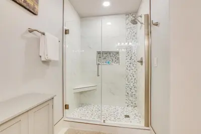 a shower with a glass door in a bathroom at Walk to Lifts Studio with Hot Tub in Keystone! in Keystone