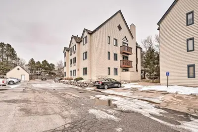 an empty street in front of a building at Condo with Patio and Pool Access in Greenwood Village! in Greenwood Village