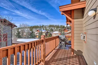 a wooden balcony with a view of the mountains at Balcony and Hot Tub Access Modern Breck Escape! in Breckenridge