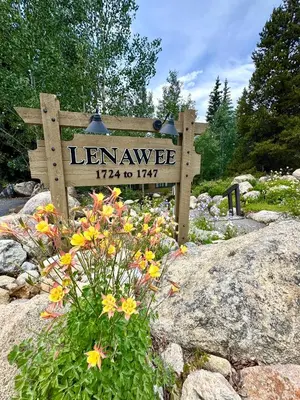 a sign for a garden with flowers in front of it at Lenawee 1741 by SummitCove Lodging in Keystone