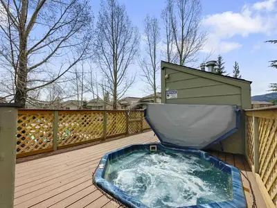 a jacuzzi tub sitting on a deck at 201 Point Drive condo in Frisco