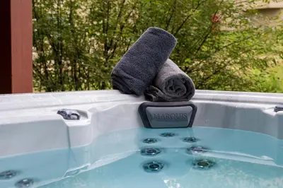 a pair of towels sitting on top of a bath tub at Bear Trail townhouse in Winter Park