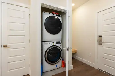 a laundry room with a washer and dryer at 204 Clearwater Lofts condo in Keystone