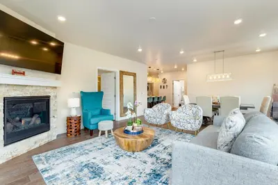 a living room with a couch and a fireplace at 204 Clearwater Lofts condo in Keystone