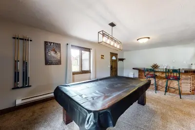 a large room with a large bed in it at The Nugget Ski Chalet in Dillon