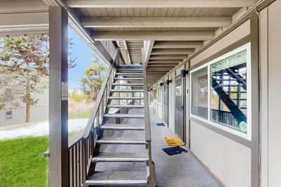 a stairway leading up to a building at Hi Country Haus Hideaway in Winter Park