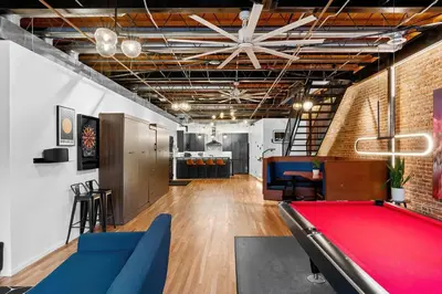 a billiard room with a pool table in it at Hotel Residential of Denver in Denver