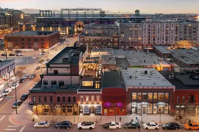 a city with cars parked in a parking lot at Hotel Residential of Denver in Denver