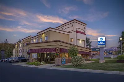 a large building with a sign in front of it at Best Western Alpenglo Lodge in Winter Park