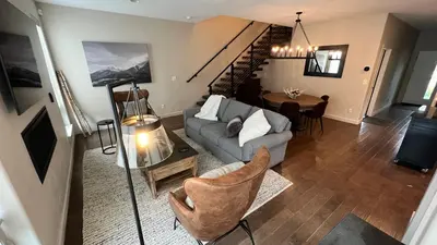 an overhead view of a living room with a couch and a table at 3BD/3BA- Updated Cozy Ski Retreat with Garage at the Base of Granby Ranch in Granby