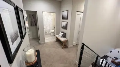 a room with a bathroom with a toilet and a staircase at 3BD/3BA- Updated Cozy Ski Retreat with Garage at the Base of Granby Ranch in Granby