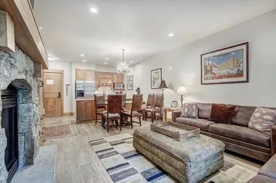 a living room with a couch and a fireplace at One-Bedroom Apartment in Dillon