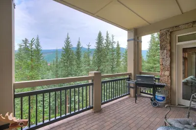 a balcony with a view of the mountains at Luxurious 3 BR in River Run Village with Ski-In Out condo in Dillon