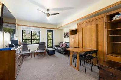 a living room with a couch and a table at 2767 Slopeside condo in Keystone