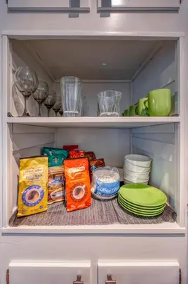 a drawer filled with food and plates in a refrigerator at Quiet Sunlit Retreat w many Travel Amenities n Grg in Lakewood