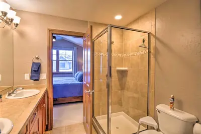 a bathroom with a shower and a toilet and a sink at 5 Mi to Breckenridge Skiing Mtn Gem with Hot Tub! in Breckenridge
