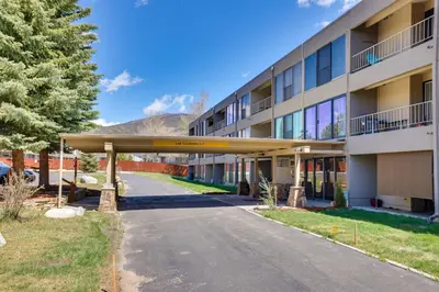 an empty street in front of a building at Mtn and Reservoir Views Cozy Dillon Condo! in Dillon