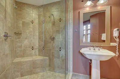 a bathroom with a sink and a shower at Luxurious 2 BR in River Run Village with Ski in ski out condo in Dillon