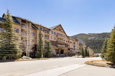 an empty street in front of a large building at 2300 Red Hawk Lodge condo in Keystone